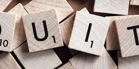 Scrabble tiles spelling equity.